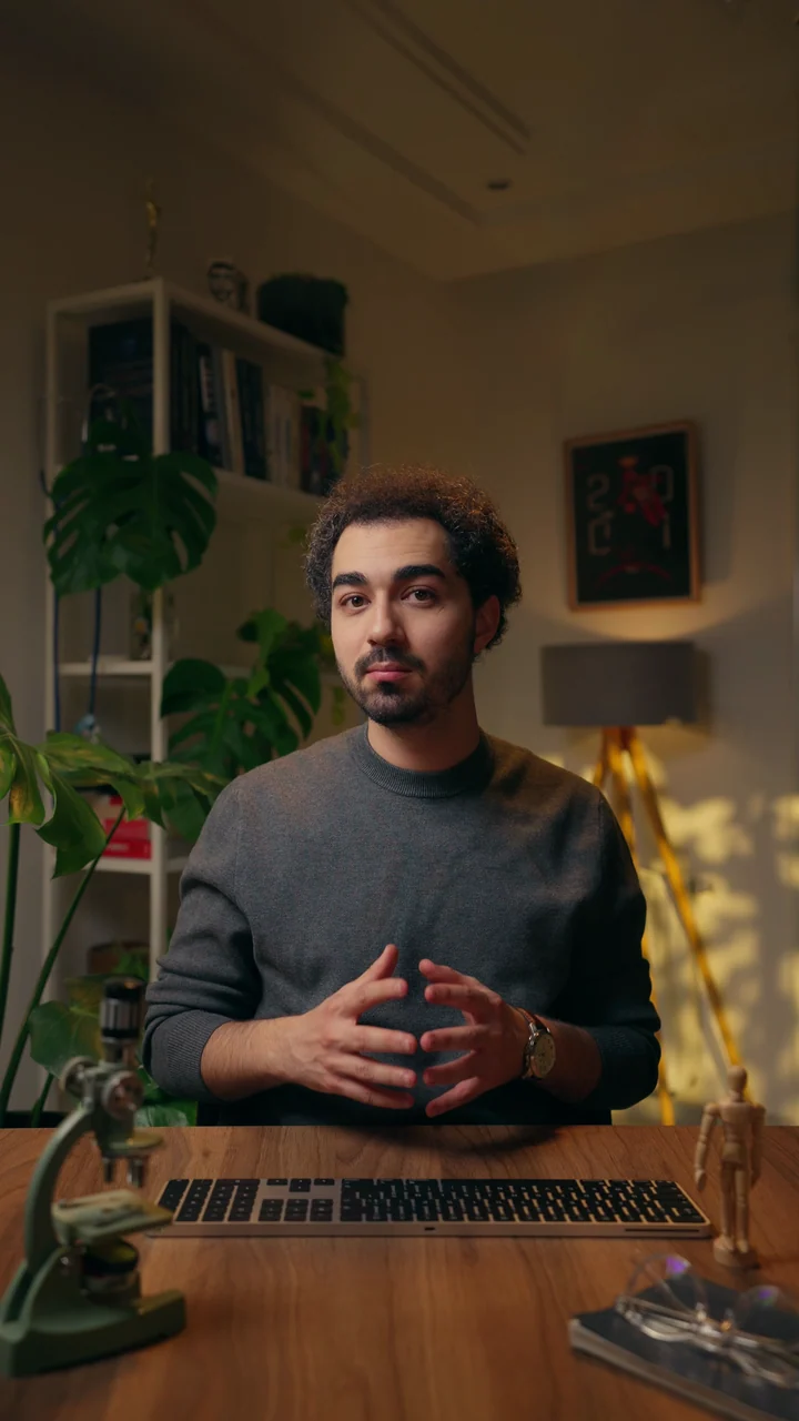 Mental health and anti-stigma: Baha presenting from his desk