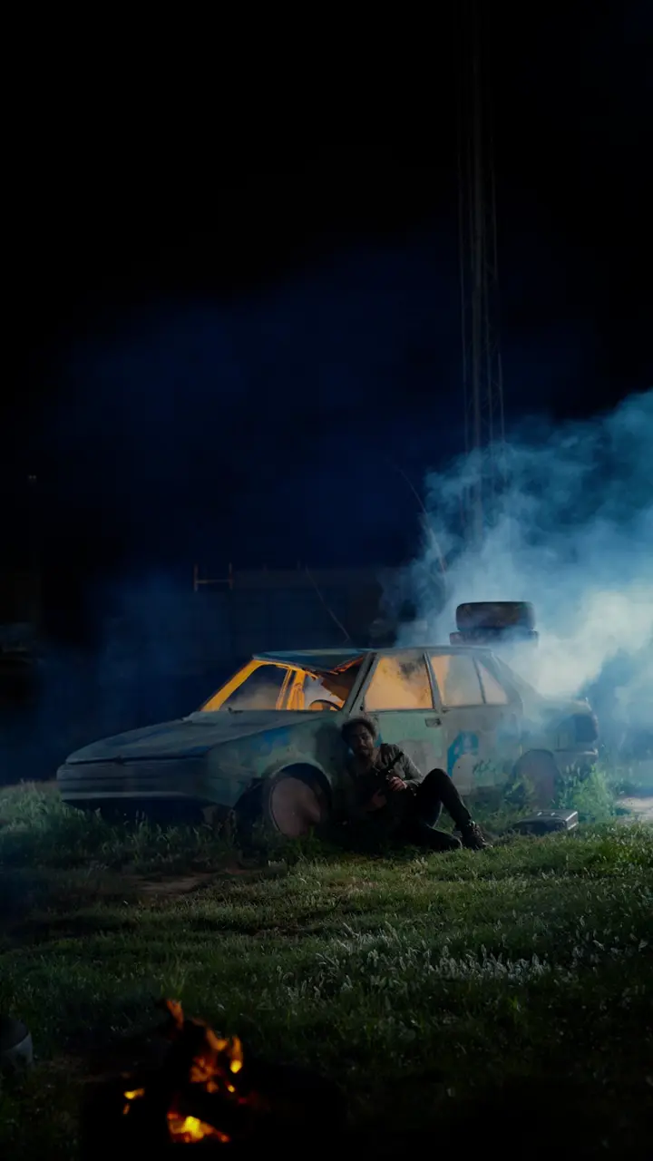 Water Scarcity film still: Baha Lajmi beside a car at night